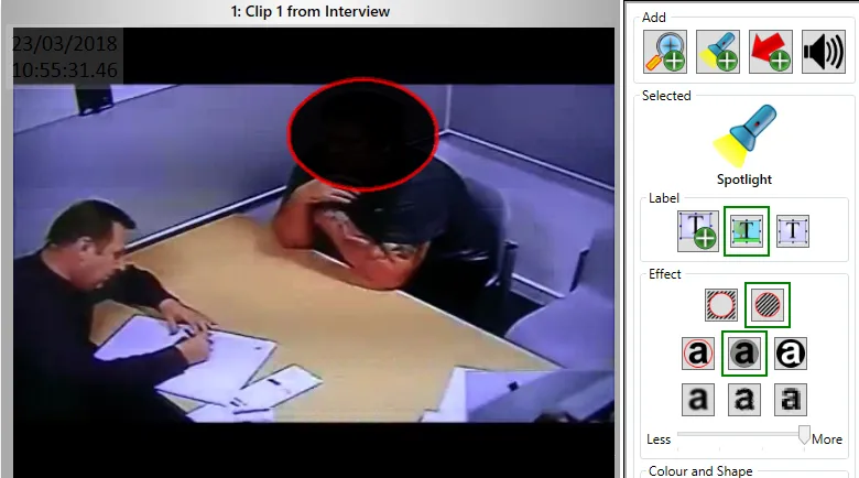The interview video with the subject’s face blacked out inside the spotlight.