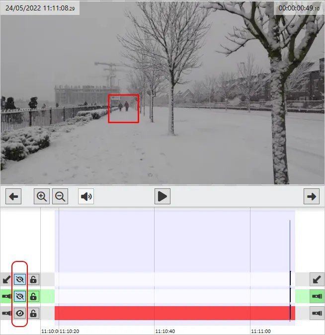 The same snowy street scene after hiding one annotation with its eye icon.
