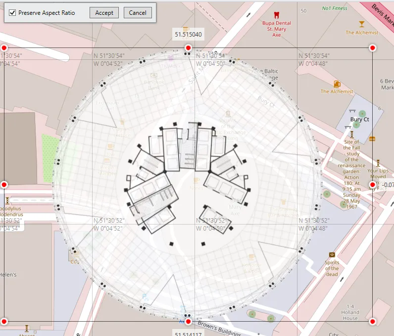 A building floor plan image in edit mode on the map, with handles for resizing.